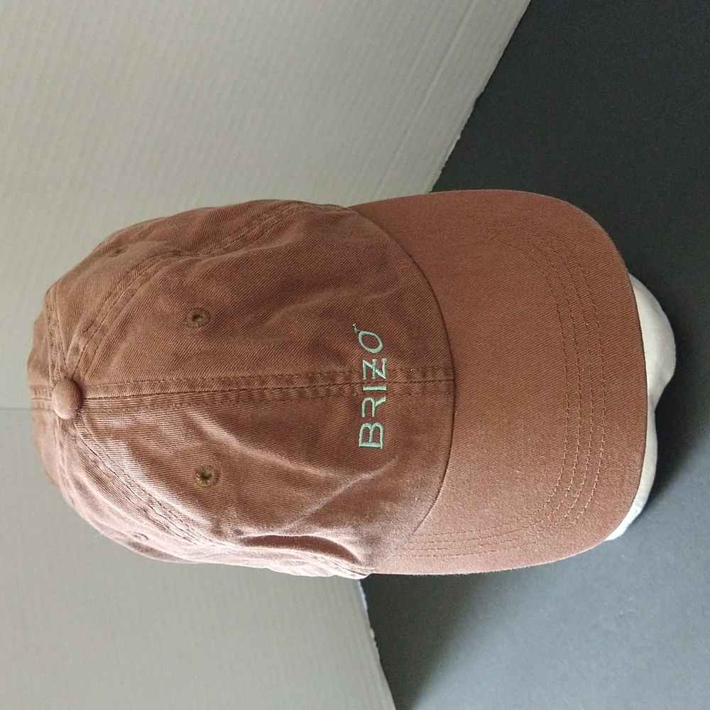 VGUC. Brizo reddish brown adjustable cap.